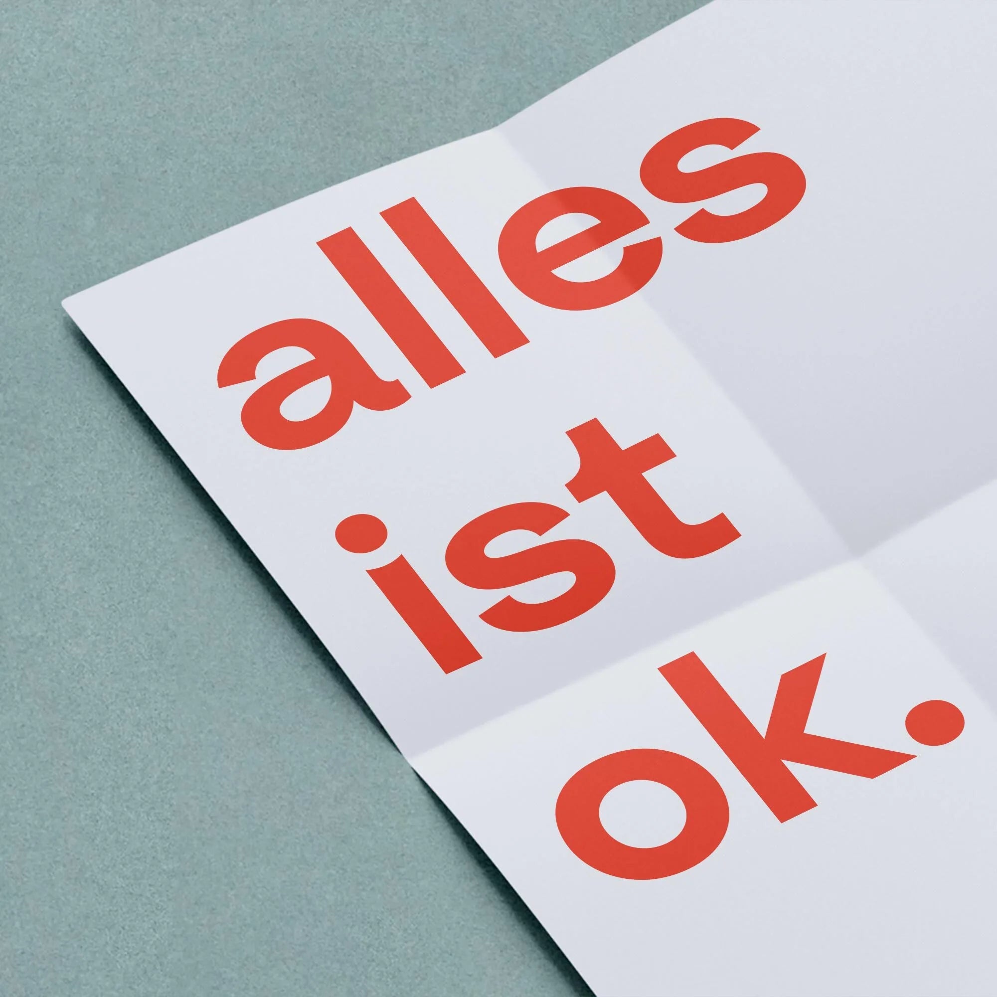 Wochenbettposter Rückseite mit "alles ist ok." in einer Nahaufnahme