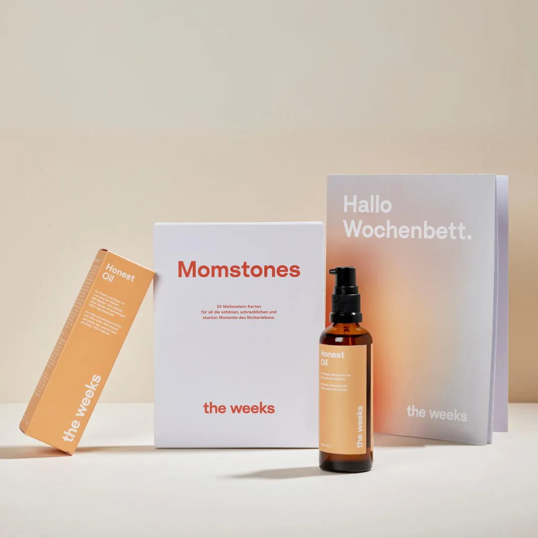 Geschenk-Box EMPOWER von the weeks. Es sind Honest OIl, Momstone sund das Wochenbettposter zu sehen.